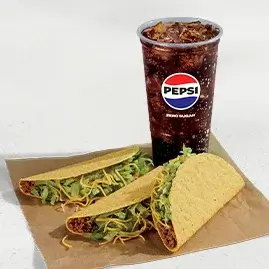A 3 Crunchy Tacos Combo featuring three tacos, nacho chips, and a drink.