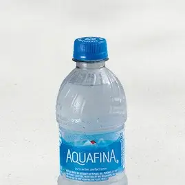 A bottle of Aquafina® water from Taco Bell, offering crisp and pure hydration that perfectly complements any meal.