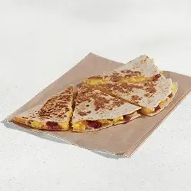 A Breakfast Quesadilla filled with bacon, eggs, and cheese.