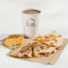 A Breakfast Quesadilla Combo with a quesadilla, hash browns, and a drink.
