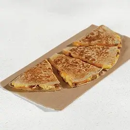 A Breakfast Quesadilla filled with sausage, eggs, and cheese.