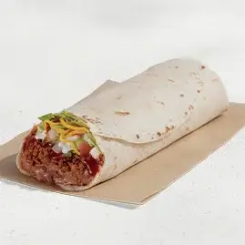 A Burrito Supreme® filled with seasoned beef, beans, crisp lettuce, diced tomatoes, onions, shredded cheese, and red sauce, all wrapped in a soft flour tortilla.






