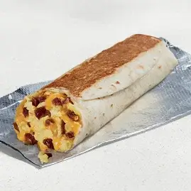 A Cheesy Toasted Breakfast Burrito with bacon, eggs, and cheese wrapped in a toasted tortilla.