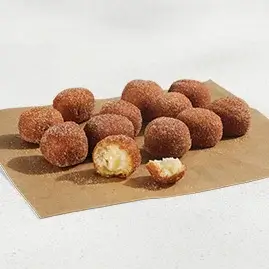 A box of 12 Cinnabon Delights® filled with warm, gooey cinnamon and sugar.