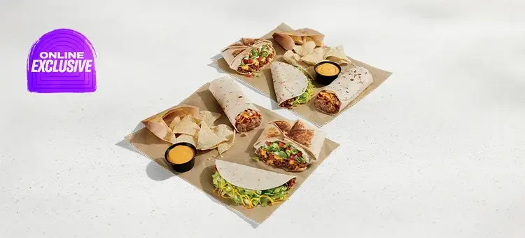 A Meal for 2 featuring an assortment of tacos, burritos, nacho chips, and drinks.