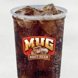 A cold cup of Mug® Root Beer, delivering the smooth and creamy flavor of classic root beer in a refreshing soda.