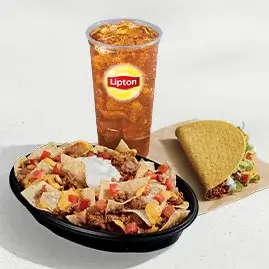 A Nachos BellGrande® Combo with a generous serving of nachos, a crunchy taco, and a medium fountain drink.
