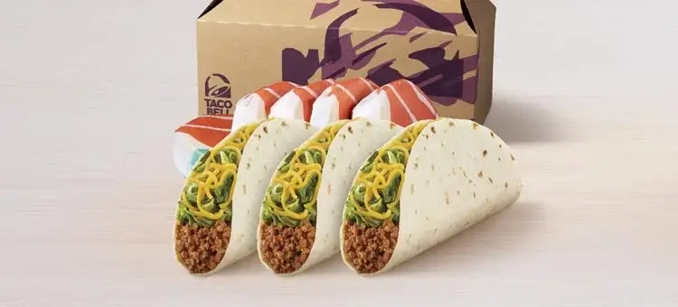 A bag of soft tacos filled with beef, lettuce, tomatoes, and cheese, ideal for a party.