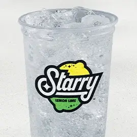 A cold cup of Starry®, showcasing the bright and refreshing lemon-lime flavor in a bubbly, crisp soda.