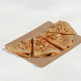 A Steak Quesadilla with tender grilled steak, melted cheese, and creamy sauce, all wrapped in a grilled flour tortilla.