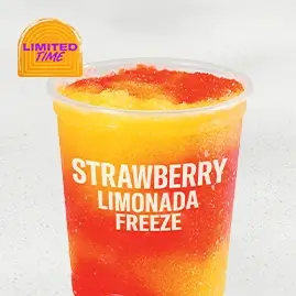 A refreshing Strawberry Limonada Freeze, a vibrant pink drink served in a frosty cup.