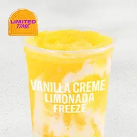 A Vanilla Creme Limonada Freeze, a frosty drink with layers of vanilla and lemon flavors.